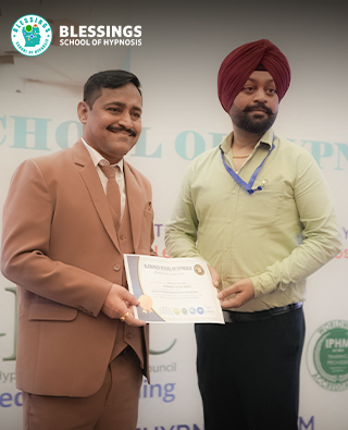 Student Holding Certificate